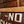 Load image into Gallery viewer, A close up image of the wooden frame on a vintage "No Smoking" sign.