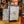 Load image into Gallery viewer, Side view of a white metal cabinet with the front door open.