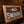 Load image into Gallery viewer, A side view of a vintage brown "No Smoking" sign.