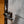 A close up of a steel handle on the cabinet of a refurbished hospital cart. 