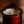 Load image into Gallery viewer, Candle in a brown jar with a blurred background
